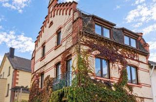 Haus kaufen in 55128 Bretzenheim, Jung & Kern Immobilien - Charaktervolles Wohnhaus mit markanter Ziegelfassade im alten Ortskern