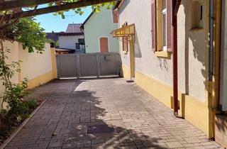 Wohnung kaufen in 67105 Schifferstadt, Altbaucharme trifft auf großen Privatgarten