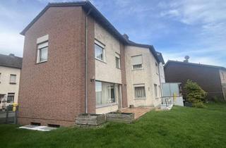 Haus kaufen in 52249 Eschweiler, Einseitig angebautes Familiendomizil in Waldrandlage