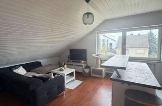 Wohnung kaufen in 53859 Niederkassel, 2-Zimmer-Dachgeschosswohnung mit Stellplatz und Keller – 49 m² Wohnfläche