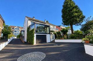 Haus kaufen in 40724 Hilden, Gepflegtes Ein-/ Zweifamilienhaus mit Garten, Garage und Stellplätzen im Hildener Osten!