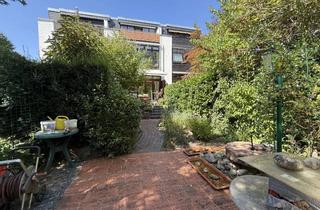 Reihenhaus kaufen in 60488 Praunheim, Lichtdurchflutetes Architekten-Reihenhaus mit Wintergarten, Balkon & Traumgarten
